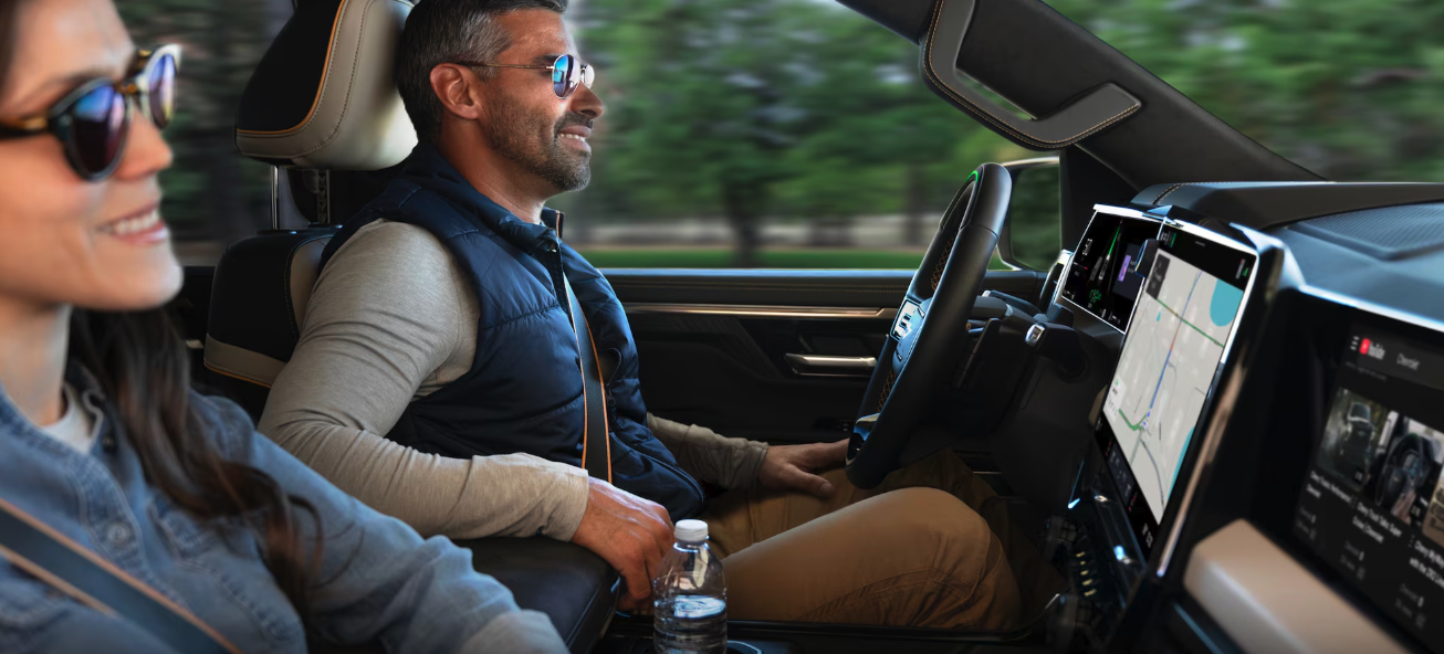 2027 Chevrolet Silverado 1500 interior showing 16.3-inch center display and folding console workspace