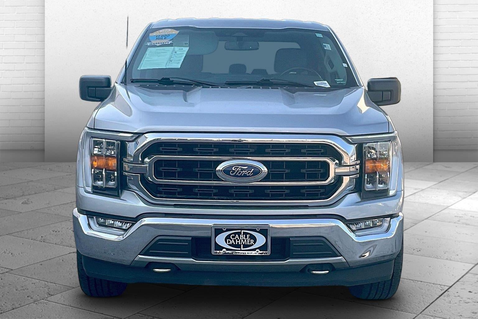 Used 2021 Ford F-150 XLT with VIN 1FTFW1E85MFA72165 for sale in Kansas City