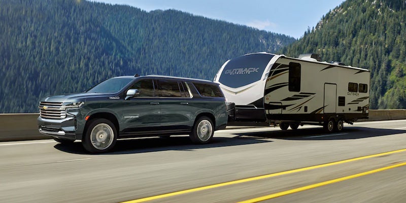 Pre-owned 2022 Chevy Suburban towing capability and V8 performance